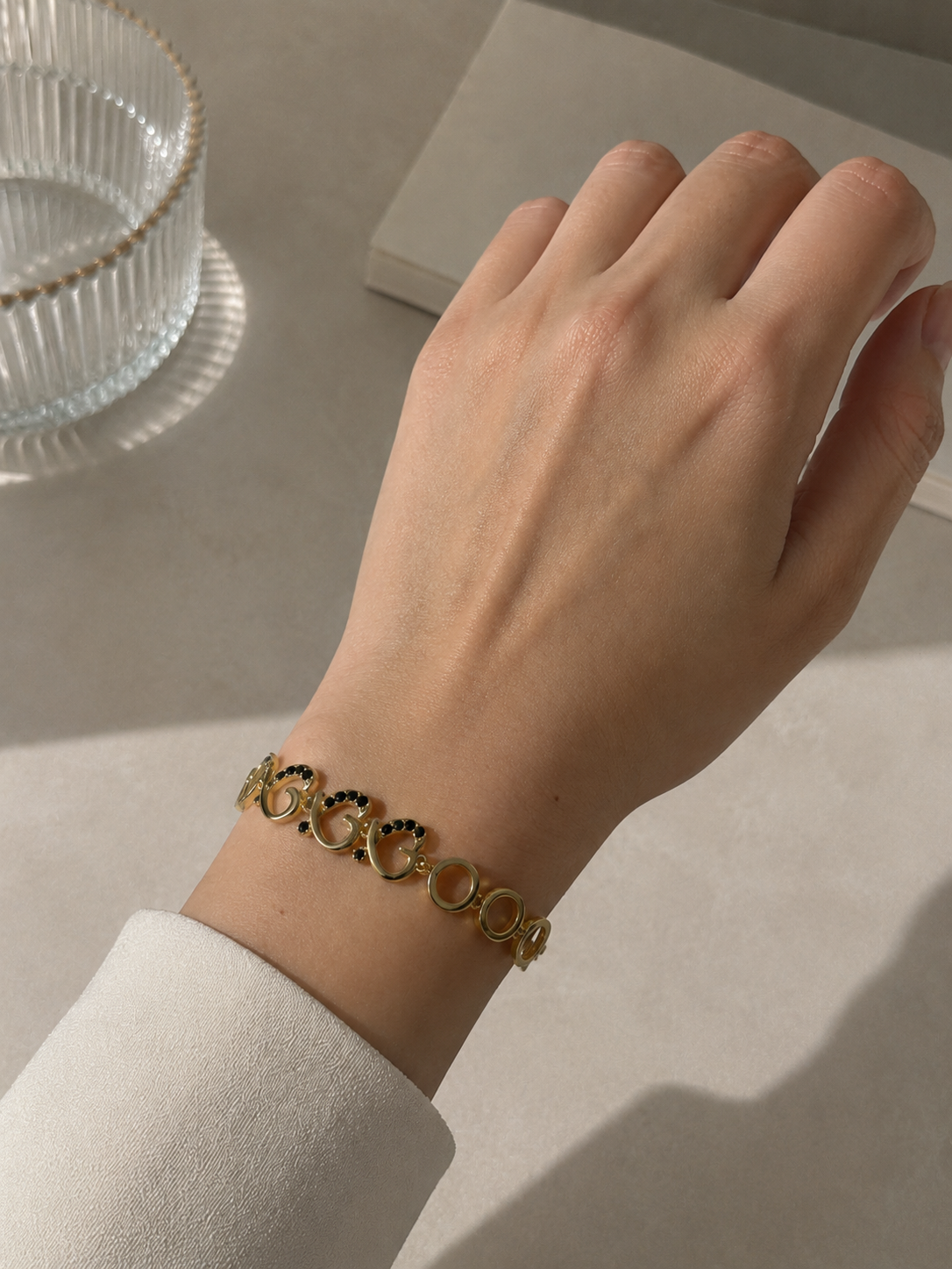 Gold plated multicolor infinity link bracelet for women .
