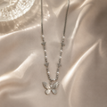 Rhodium-Plated Butterfly Charm Necklace with Pearl Accents