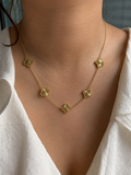 Stainless Steel Necklace Features Five Floral charms