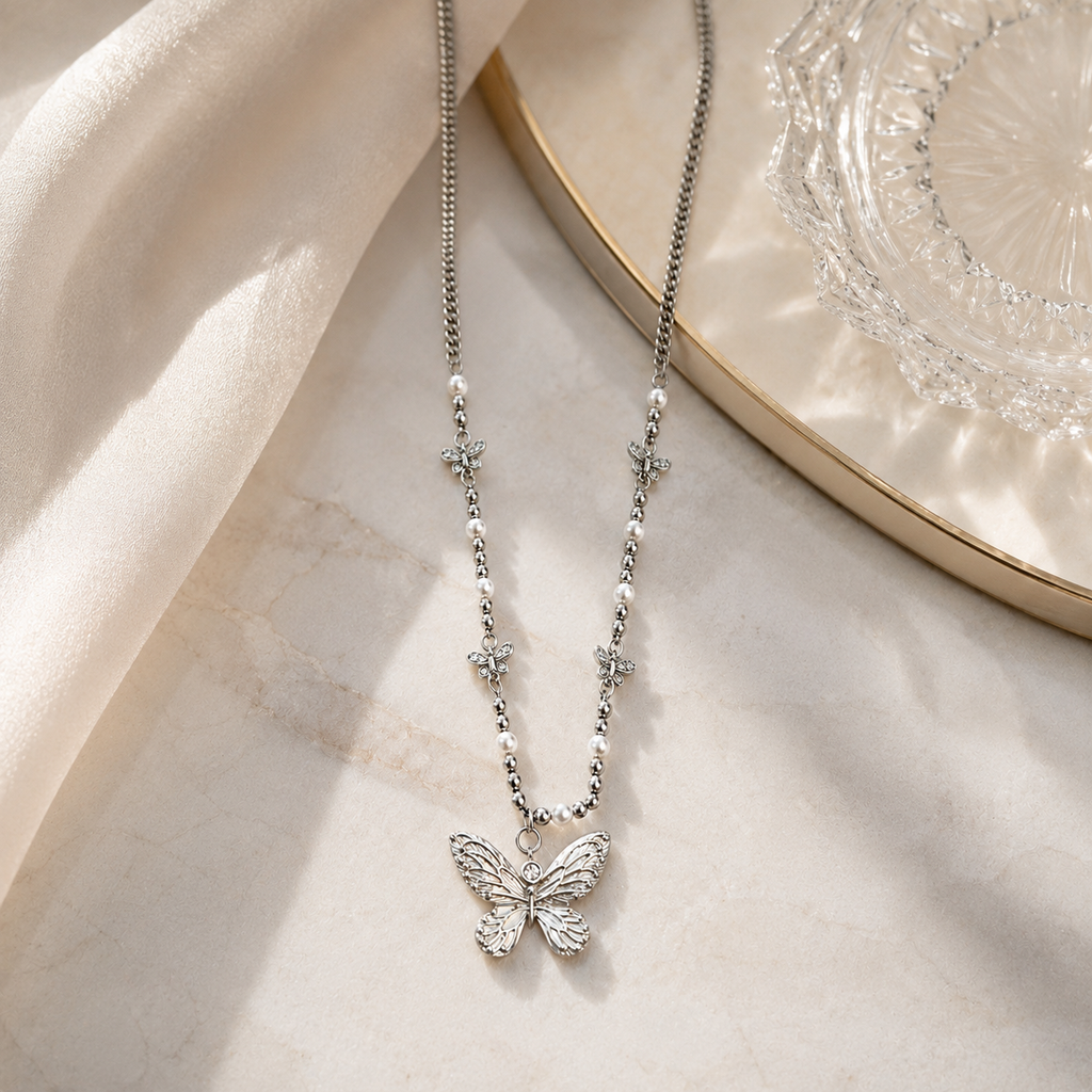 Rhodium-Plated Butterfly Charm Necklace with Pearl Accents