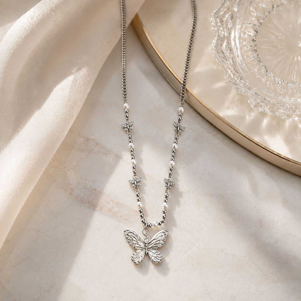 Rhodium-Plated Butterfly Charm Necklace with Pearl Accents